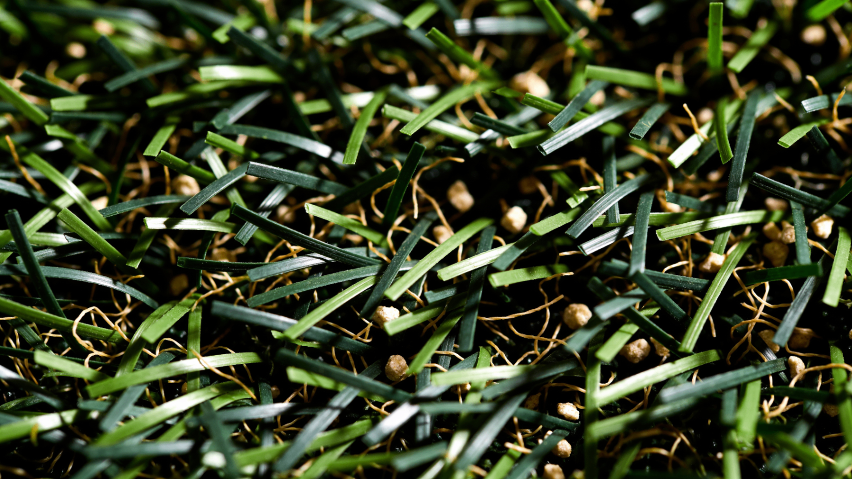 Close-up view of high-end artificial turf fibers installed by Turf Time Arizona.